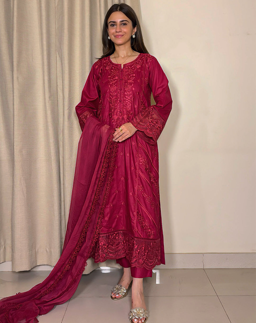 Set of three women's clothing pieces in Crimson Glaze by Libbasium, featuring stylish fabric and vibrant color details.