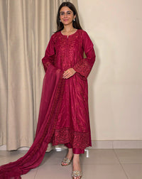 Set of three women's clothing pieces in Crimson Glaze by Libbasium, featuring stylish fabric and vibrant color details.